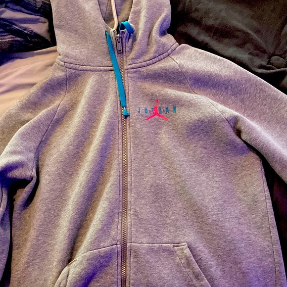 I am selling a pink blue and grey jorden hoodie that comes with a matching shirt
